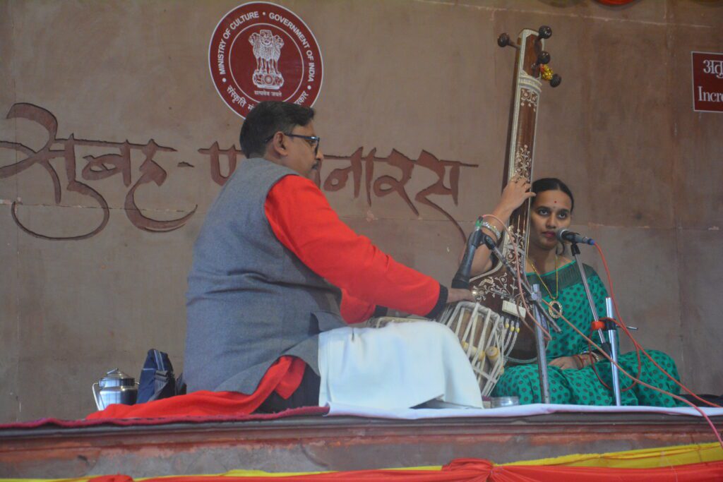 Vocal music at Subh E Banaras, evening aarti varanasi, ganga aarti varanasi, dashashwamedh ghat aarti, varanasi boat ride, morning boat ride varanasi, subah e banaras varanasi, assi ghat morning aarti, kabir chaura varanasi, lanes of varanasi, mansingh observatory varanasi, museum varanasi, holy dip ganga varanasi, kashi vishwanath abhishek, abhishek booking kashi vishwanath, madanpura varanasi, lallapura varanasi, banarasi saree weaving, sarnath varanasi, buddha sarnath, things to do in varanasi, varanasi tourism guide, places to visit varanasi, best ghats in varanasi, varanasi temples, spiritual experiences varanasi, cultural activities varanasi, varanasi at night, varanasi in the morning, exploring varanasi, varanasi travel, varanasi itinerary, one day varanasi trip, two day varanasi trip, varanasi travel tips, best time to visit varanasi, varanasi weather, hotels near ghats varanasi, guest houses varanasi, local food varanasi, street food tour varanasi, banarasi paan, shopping in varanasi, ganga river varanasi, ghats of varanasi, kashi vishwanath temple, sankat mochan temple, assi ghat, manikarnika ghat, dasaswamedh ghat, sarnath museum, deer park sarnath, dhamek stupa, mulagandha kutir vihara, banaras hindu university, ramnagar fort, chaukhandi stupa sarnath, varanasi heritage walk, walking tour varanasi, boat tour varanasi, varanasi with family, varanasi for solo travelers, varanasi for couples, religious tour varanasi, spiritual tour india, yoga in varanasi, meditation centers varanasi, ashrams in varanasi, pilgrimage sites near varanasi, varanasi local culture, festivals of varanasi, history of varanasi, architecture of varanasi, photography tour varanasi, virtual tour varanasi, varanasi travel blog, varanasi travel forum, varanasi safety tips, getting around varanasi, auto rickshaw in varanasi, taxi services varanasi, budget travel varanasi, luxury travel varanasi, varanasi travel packages, india tourism varanasi, uttar pradesh tourism, incredible india varanasi, must see in varanasi, unforgettable varanasi experiences, unique things to do varanasi, hidden gems varanasi, local markets varanasi, traditional crafts varanasi, silk sarees varanasi, handloom weaving varanasi, varanasi art and culture, music of varanasi, dance in varanasi, traditions of varanasi, food tour varanasi, cooking class varanasi, varanasi sunrise, varanasi sunset, boat ride on ganges at sunrise, boat ride on ganges at sunset, evening prayers varanasi, morning rituals varanasi, life on the ghats of varanasi.